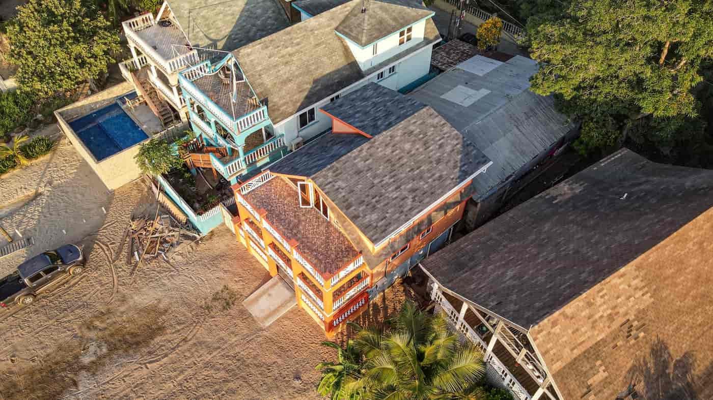 sandy-bay-beach-front-home-aerial-12.jpg